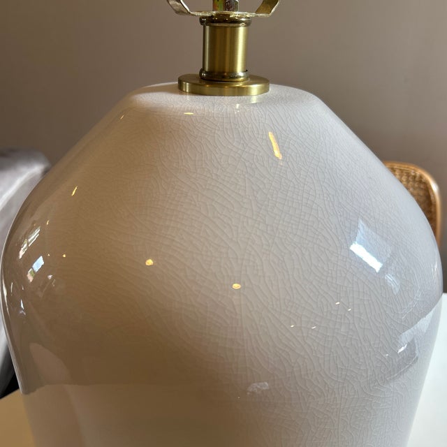 Large neutral ceramic lamp from Ralph Lauren. Three way switch. 23.5 inches to top of finial