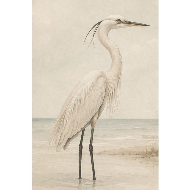 Elegant coastal artwork featuring a white egret standing in shallow shoreline water against a soft, muted horizon. The...