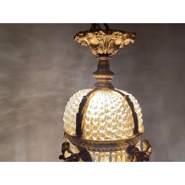 1860s French Empire Bronze & Crystal Chandelier Bring regal grandeur and historic European elegance into your interior...
