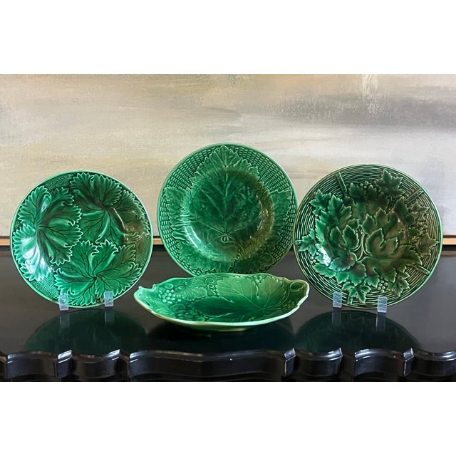 Set of four vibrant green majolica from England around the 1930's. The diameter of the plates are: 8", 8.25", and 9. The...