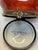 Charming hinged trinket/pill box in the shape of a ripe tomato with hand-painted green leaves. Marked inside "Limoges...
