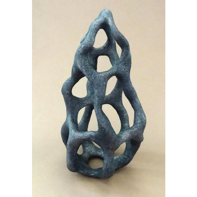 Infinity loops Stone mass h 21 cm; w 11 cm; d 11 cm Small gray color abstract sculpture "Infinity loops" from stone mass I...