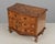 A French Louis XV style miniature commode, or sample chest. Hand-crafted of solid cherry with decorative mother of pearl...