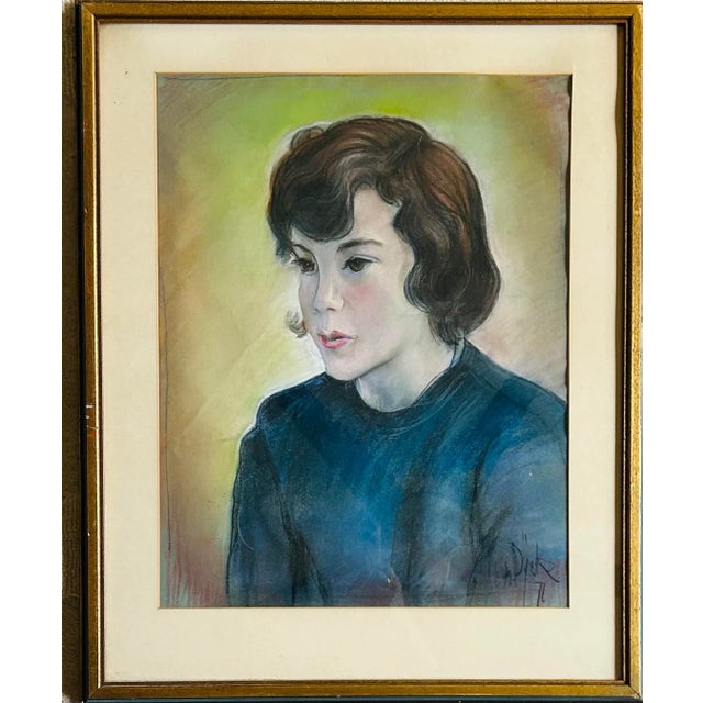 Vintage 1970’s pastel portrait of a young woman with brown hair wearing a blue sweater. Signed “Dyck” ‘71 to the lower...