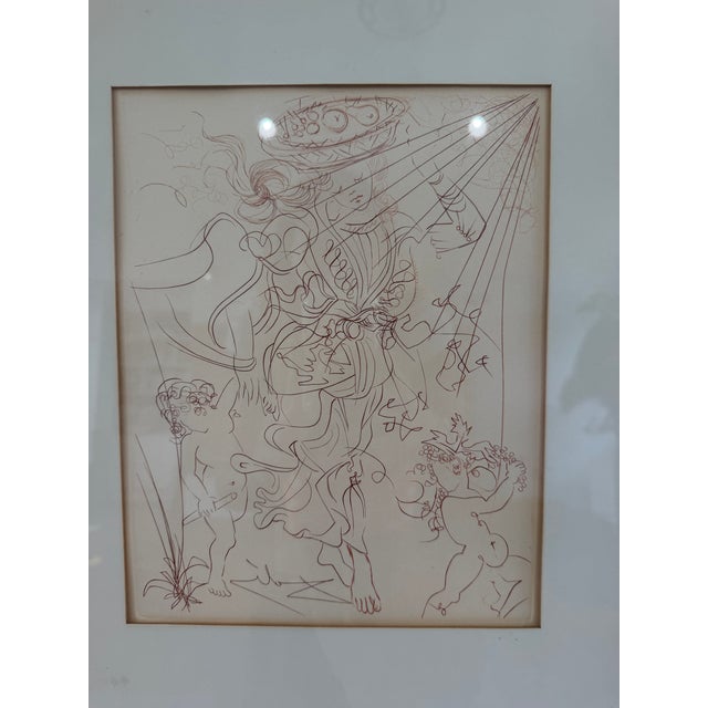 A striking 1970 limited-edition etching titled Autumn by celebrated Spanish Surrealist Salvador Dalí (1904–1989). Rendered...