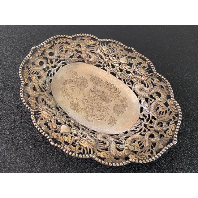 Late 19th century Chinese sterling silver dish by famed maker Wang Hing. This dish features a reticulated border of...