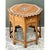 This vintage octagonal side table presents a classic Anglo-Indian silhouette, with a faceted top resting on eight slender,...