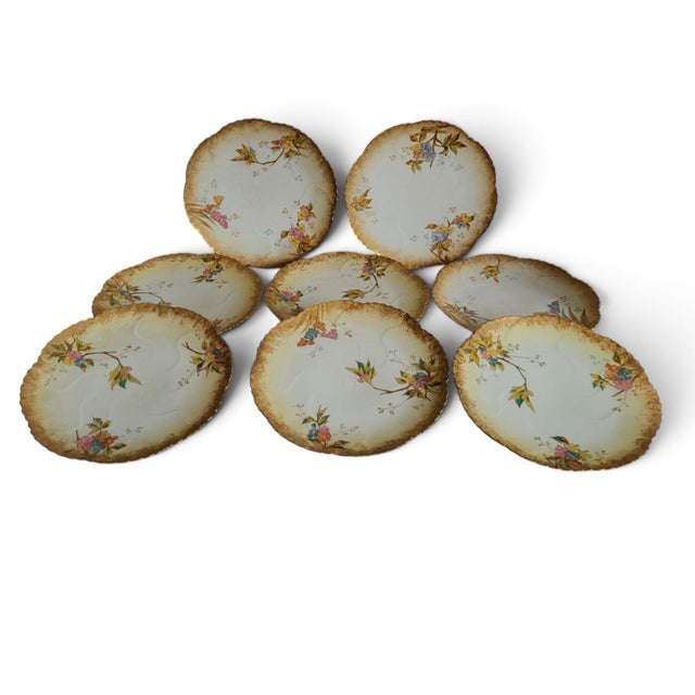 Set of 8 Limoges porcelain plates, Martial Redon factory, late 19th century Set of 8 Limoges porcelain plates with painted...