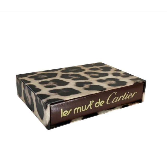 For your consideration . . . A fabulous Cartier book entitled: LES MUST de CARTIER. This book is gorgeous! The hardcover...