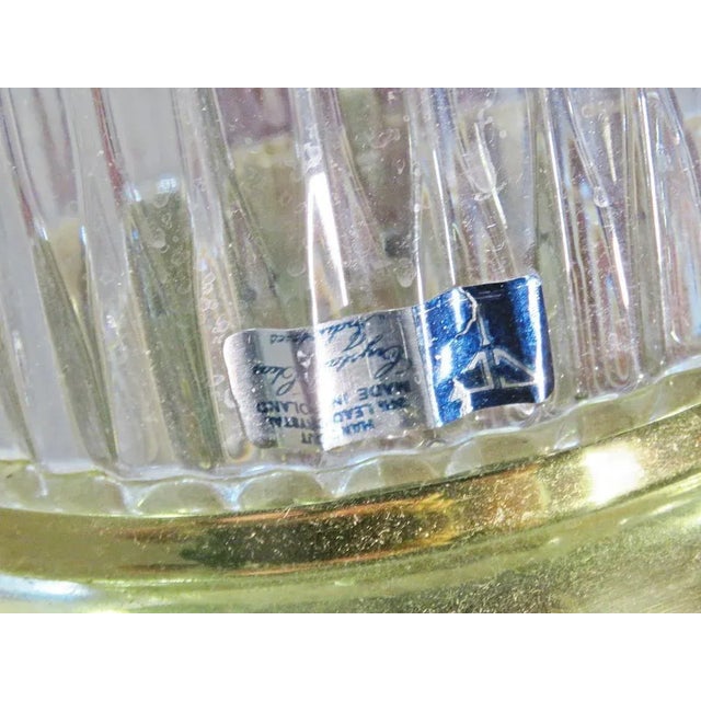 This elegant pair of brass and glass Neoclassical table lamps exudes timeless sophistication, blending classical form with...