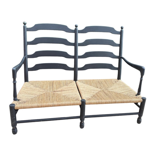A charming two-seat banc provençal crafted in the traditional southern french style, featuring elegant ladder-back...