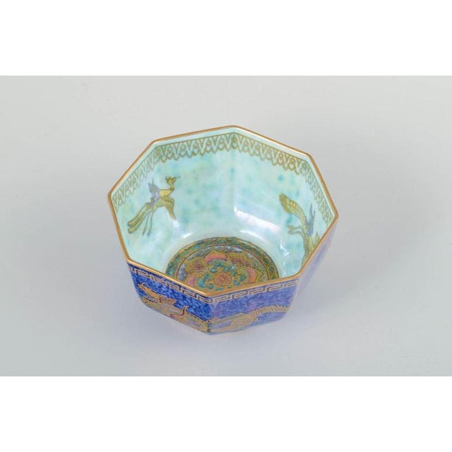 Daisy Makeig-Jones for Wedgwood. Octagonal bowl. Fairyland Lustre series. Bowl in blue-purple lustre glaze, decorated with...