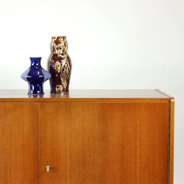 An iconic mid-century czechoslovak sideboard, model u-450, designed by jiří jiroutek for interiér praha in the 1960s. A...