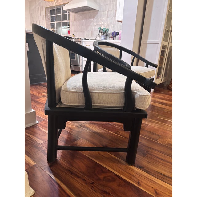 A sensational and comfortable pair of Ming armchairs from Century Furniture. The smooth black finish has a light sheen but...