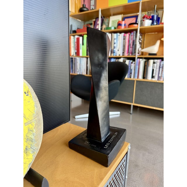 Originally designed in 1976 by the graphic design studio Hipgnosis & Alva Museum, this statue was manufactured for Led...