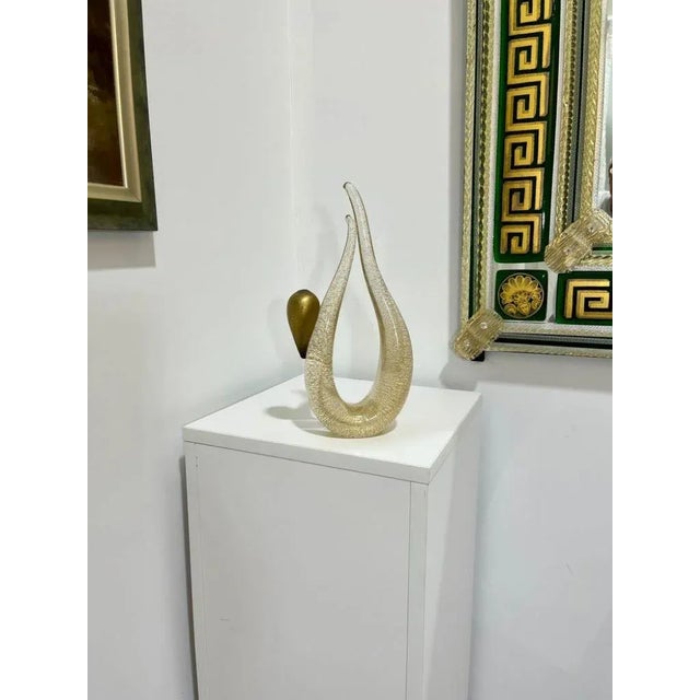 This gracefully designed figure of a gymnast was created by the Murano Glass Furnace of Gambaro and Poggi. Made with 24K...