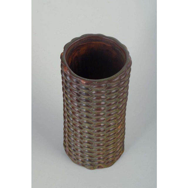 Axel Salto for Royal Copenhagen. Cylindrical ceramic vase in budding style. 1940s Organically shaped cylindrical vase in...