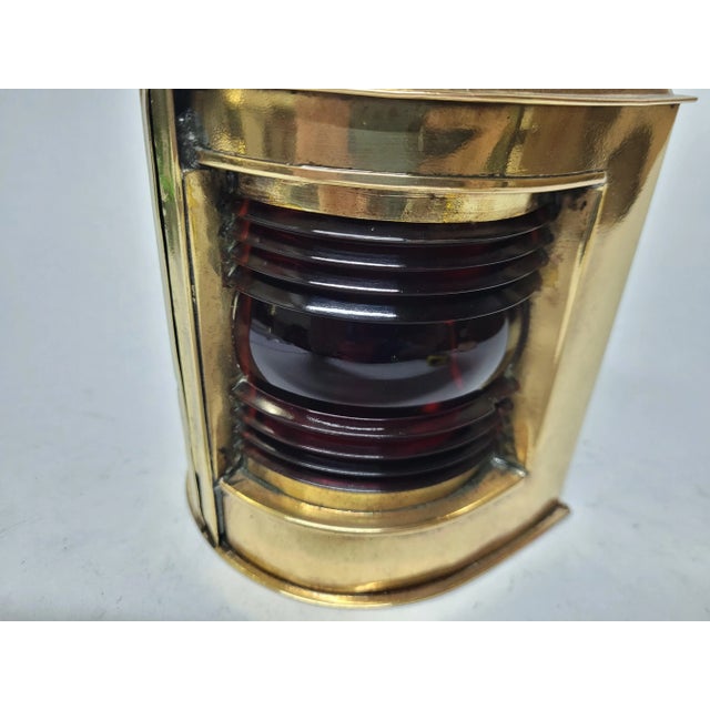 Bow lantern from a boat with red and blue fresnel glass lenses. Embossed brass makers tag from Tiebout of New York. With...