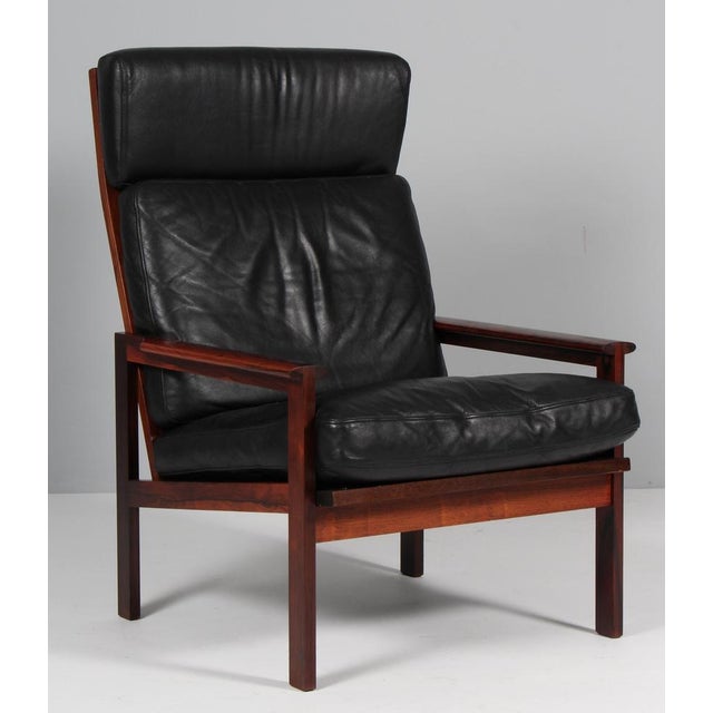 Illum Wikkelso for N. Eilersen Lounge Chair of Rosewood Original upholstery, patinated nature leather. Model Capella, made...