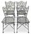 Set of four Wrought Iron chairs with matching table. Dimensions of chair: 20"x24"x40" Dimensions of table: 60"x32.5"x28.5"