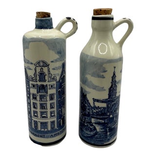 Vintage Delft Blue and White Ceramic Jugs With Amsterdam Scenes by Holland America Line - A Pair For Sale