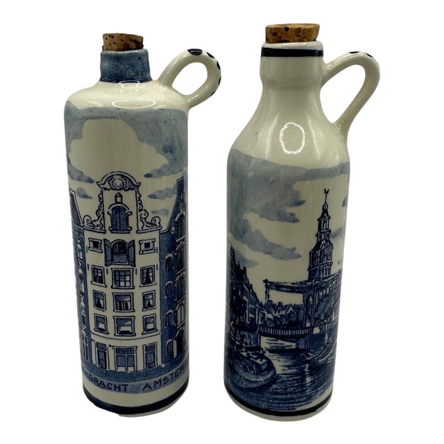 Vintage Delft Blue and White Ceramic Jugs With Amsterdam Scenes by Holland America Line - A Pair For Sale