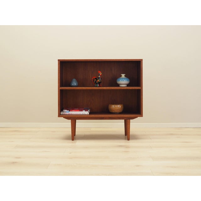 The bookcase was made in the Scandinavian style. The structure is covered with oak veneer. The legs are made of solid...