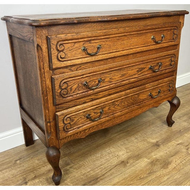 This elegant Vintage French Louis chest of drawers combines classic French styling with practical storage, making it an...