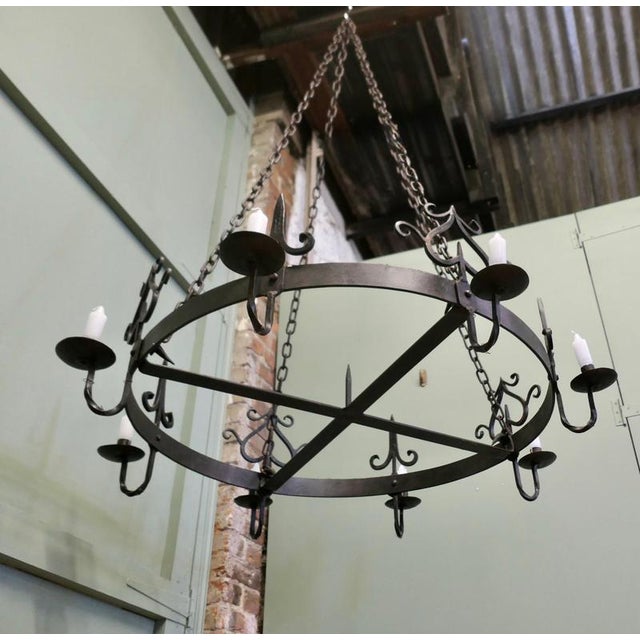 Enormous French Gothic Castle Chandelier (Candelier) This very large and heavy circular blacksmith made chandelier...