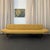 This long sleek Mid-century Modern gondola sofa daybed circa 1960s was made in the style of the American designer Adrian...