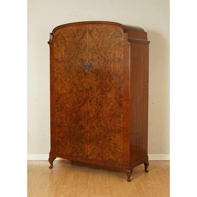 Art deco burr walnut double wardrobe. A very lovely solid and well-made wardrobe, there is damage on side of the wardrobe...