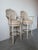 A beautifully crafted pair of vintage carved wood swivel bar stools featuring hand-carved rope twist detailing throughout...