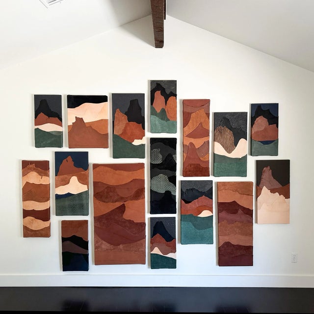 This painting is 36 x 12 inches. The layered leather on canvas evokes the red desert landscapes of the American West. It...