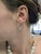 These stylish 14k gold earrings measure 23x18mm and are crafted from 1.53g of gold, offering a sleek and classic design....