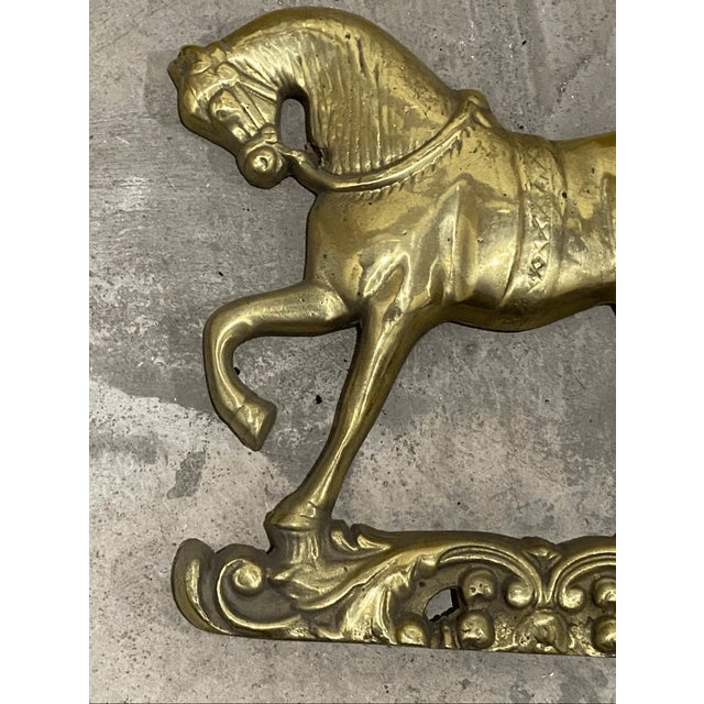 Good condition This striking piece features a horse in a proud, prancing pose, rendered in high-relief detail. The...