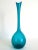 This vintage mid Century Modernist hand blown aqua teal blue art glass bottle vase is a very special and unique piece to...