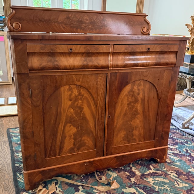 Vintage Flame Mahogany Sideboard A pretty, yet substantial, piece that will anchor a room with age and character. Arched...
