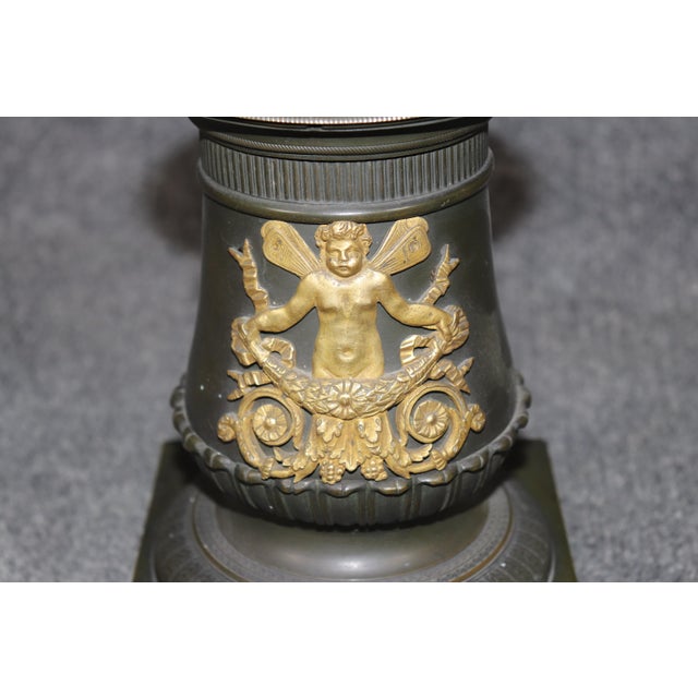 There are table lamps… and then there are table lamps that look as though they once illuminated whispered strategy...