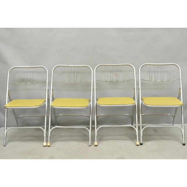 Vintage Mid Century Modern Aluminum Folding Dining/Game Chairs by Airlite - Set of 4. Circa Mid 20th Century....