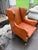 This classic leather wingback chair is upholstered in a rich saddle-colored leather with a warm, timeless patina. Designed...