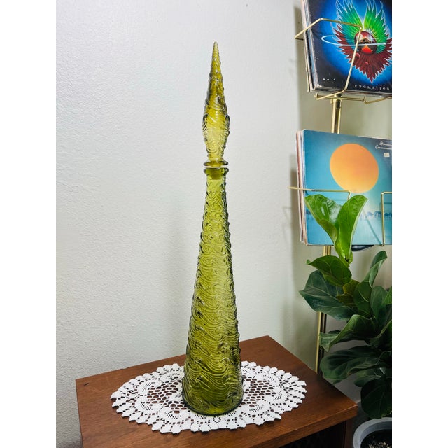 Vintage Empoli Wave Decanter/Geanie Bottle in good condition made in Italy no chips or cracks. Rare Olive Green Color....