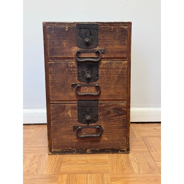 A beautifully worn Japanese ko-tansu (small chest) dating to the Meiji period, circa 1868–1912. Constructed of sugi...