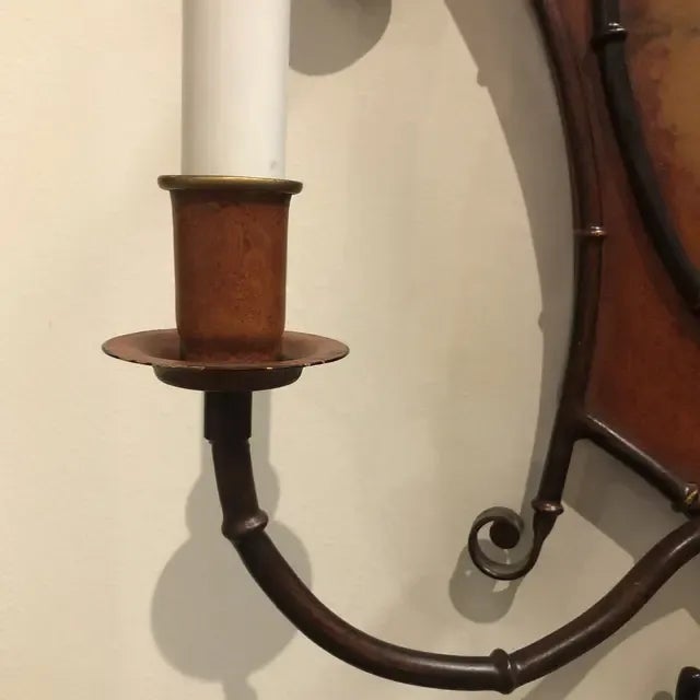 Hand painted metal sconce for two electric candles. Featuring a Chinoisserie scene, with metal bells and bamboo accents in...