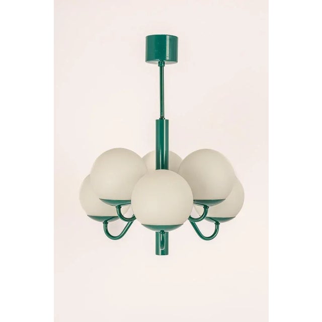 Wonderful sputnik pendant light made by kaiser leuchten, germany, circa 1970-1979. Great atomium-shaped chandelier with 6...