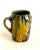 Beautiful French glazed majolica cup with handle. Vivid drip glaze colors and patina.