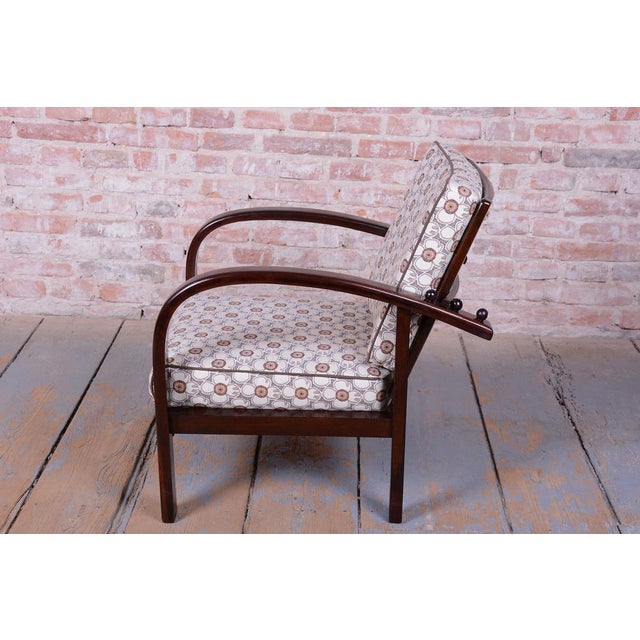 This reclining armchair is a rare example of the Czech version of the Art Deco style from the early 20th century. The...