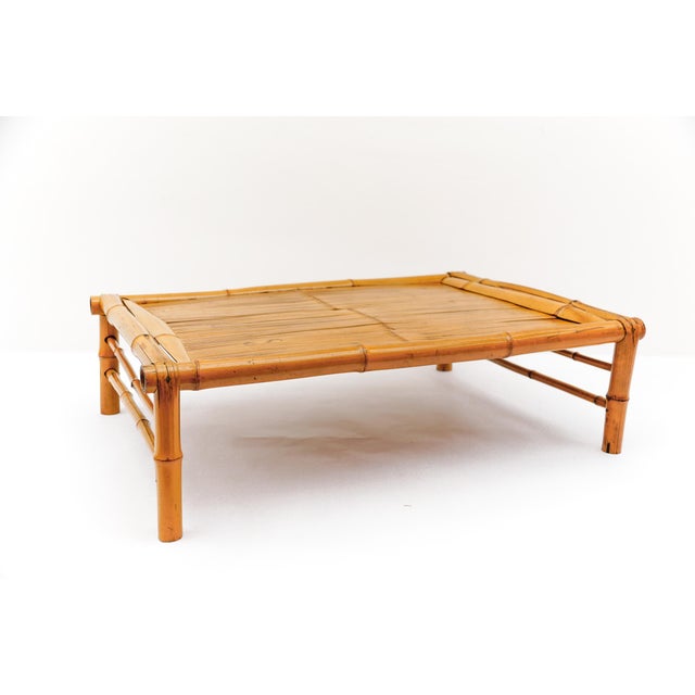 A minimalist, Japanese-style, handcrafted bamboo coffee table with no metal screws. The craftsmanship used to make this...