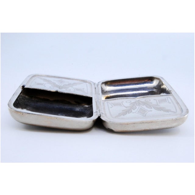Silver Cigarette Case with Garlands Engraved on the Hinged Lid and Interior with Two Compartments., in Good conditions....