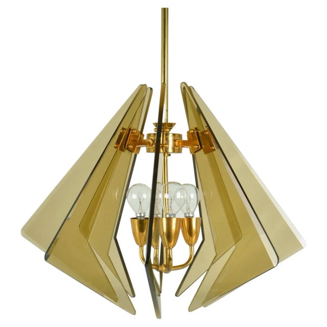 Murano glass diamond shaped chandelier consists of eight triangular pieces of tinted and faceted hand cut glass. They have...