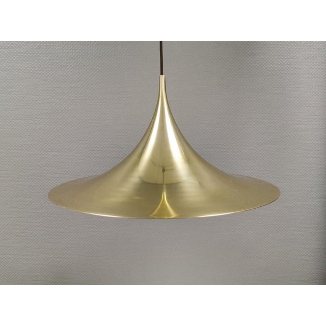 ‘golden’ semi-pendant lamp, designed by claus bonderup & torsten thorup for fog & mørup denmark in 1974. this is one of...